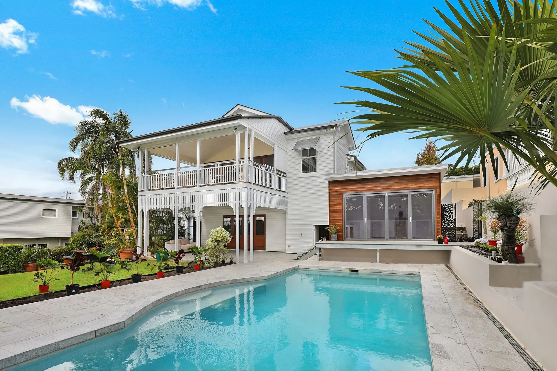 Contemporary home with a landscaped garden and pool, illustrative architecture